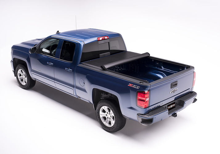 Dark Blue Truck With Roll Up Cover