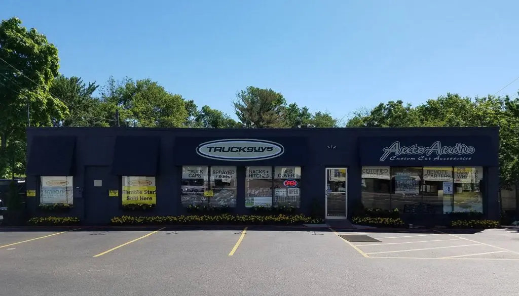 A storefront of "truck guys & auto audio" featuring vehicle accessories and installation services.